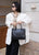 Noir Embossed Leather Handbag